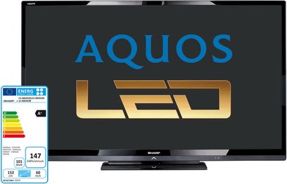 Sharp LC-60LE635E-fladskærms-tv med "AQUOS LED"-logo og A+ energimærke vist på en sort baggrund