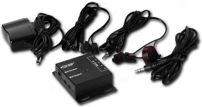 Norstone Design Iryx II wireless transmitter, multiple black cables with 3.5mm jack connectors, top view
