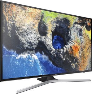Televizor Samsung UE40MU6105 s plochou obrazovkou, tenkým černým rámečkem, na stříbrném podstavci, zobrazující barevný obraz skalnatého útesu