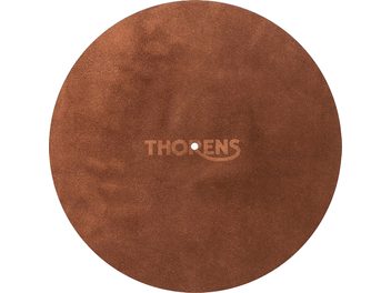 Sirkulært tallerkendeksel i brun lærfilt, sett ovenfra, Thorens-logo sentrert, synlig sentralhull