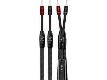 AudioQuest Lone Ranger speaker cable with black braided sleeve, red/black banana plugs, 72V DBS module with LED, front view
