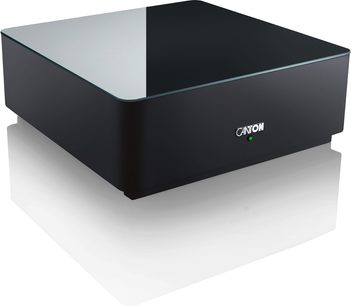 Subwoofer Canton Smart Sub 10 czarny, niska sześcienna obudowa, szklany błyszczący blat i zielona dioda LED z przodu