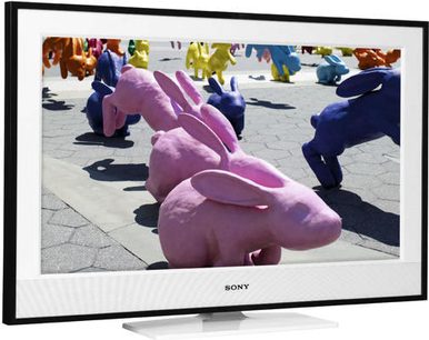 Sony KDL-32E4000 TV-skærm, der viser farvede bamser på et flisegulv, set forfra