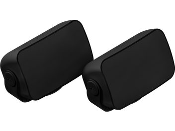Dos altavoces exteriores negros Sonos Outdoor By Sonance, de forma rectangular redondeada, vistos de frente, uno al lado del otro sobre un fondo blanco