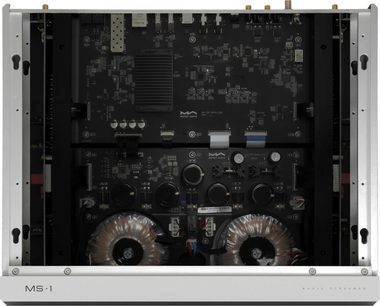 Lettore audio di rete Matrix Audio MS‑1 argento, chassis in alluminio visto dall’alto con coperchio rimosso, schede elettroniche nere e due trasformatori toroidali metallizzati ben visibili