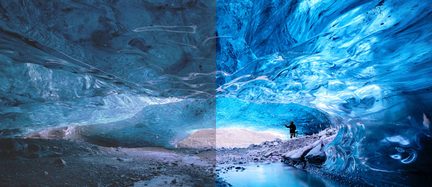 Indre af en blå isgrotte, tekstureret translucid hvælving, klippegrund og bæk, menneskelig silhuet