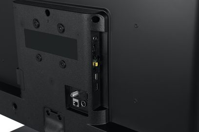 Panasonic TB-32S45AEZ, set bagfra, synlige tilslutninger: HDMI, USB, antenne, netværksport, sort tekstureret overflade