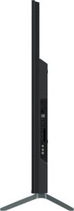 Panasonic TV-65W95AEG højdefinitionsfjernsyn, set fra siden, ultratynd sort skærm, synlige tilslutninger, metalfod
