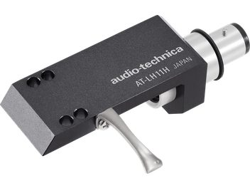 Juodas „Audio-Technica AT-LH11H“ galvutės laikiklis su stačiakampiu metaliniu korpusu ir baltu logotipu, sidabriniu svirtimi ir jungtimi