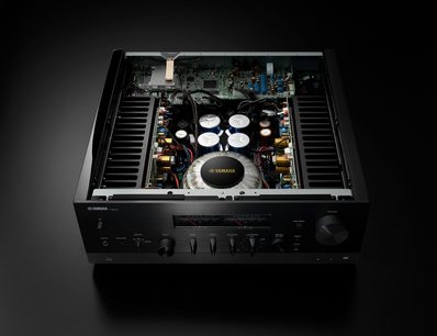 Yamaha R-N2000A silver stereo hi-fi amplifier, top interior view showing electronic components and heat sinks