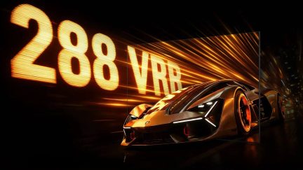 Lamborghini Revuelto oranžová v pohledu zepředu ze tří čtvrtin na černém pozadí se světelným nápisem 288 VRR