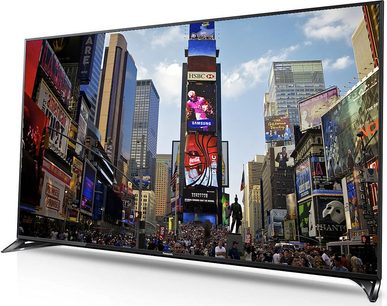 Telewizor Panasonic TX-50CX800 wyświetlający animowaną i pełną światła scenę z Times Square w Nowym Jorku