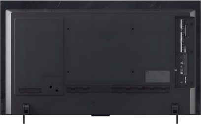 Τηλεόραση LG OLED42C5 2025 μαύρη σε ματ πλαστικό, πλήρης πίσω όψη με μεγάλο λείο πάνελ, κάτω αεραγωγούς, πλευρικό διαμέρισμα συνδέσεων και δύο λεπτά πόδια