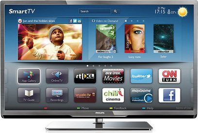 Philips 32PFL5007H-fladskærms-TV med SmartTV-grænseflade, der viser miniaturebilleder af film, tv-serier og apps