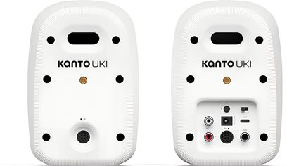 Coppia di diffusori Kanto UKI bianco opaco, vista posteriore con connettori audio e base arrotondata