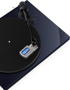 Gramofon hi-fi Triangle Lunar 3 niebieski, widok z góry, czarny talerz, czarne ramię odczytu, srebrna cyfrowa waga