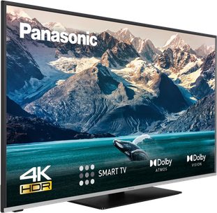 Panasonic TX-55LX610E 4K HDR Smart TV, der viser et billede af sneklædte bjerge og en turkis sø