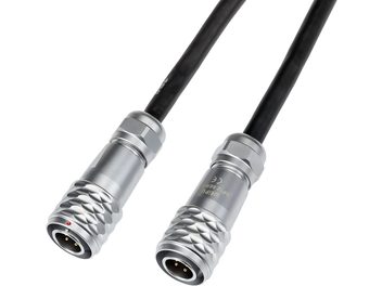 Cablu audio DIN negru cu doi conectori circulari metalici argintii cu 3 pini, suprafață texturată a mufei