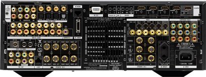 Front view of a Harman Kardon AVR-760 home theater receiver with numerous inputs, buttons, and an LCD screen