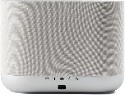 Šedý bezdrátový reproduktor Denon Home 400, zadní pohled, textilní mřížka a bílá základna s porty Connect, Aux a USB