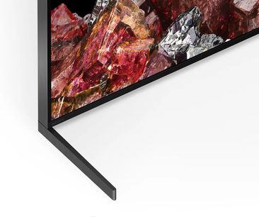 Sony 65X95L teler, mis näitab detailset pilti punastest ja hallides mineraalidest, vaadatuna eest ja küljelt valgel taustal
