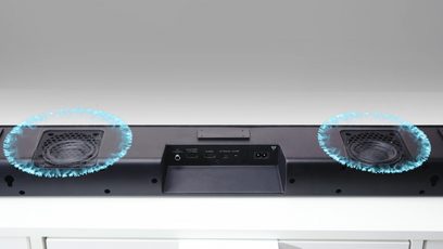Denon DHT-S216 sort soundbar set forfra, med to runde højttalere med blå belysning i enderne