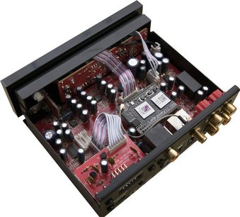 Advance Paris WTX-StreamPro sort netværksaudioafspiller, set ovenfra i et dykkende perspektiv, med synlige elektroniske komponenter