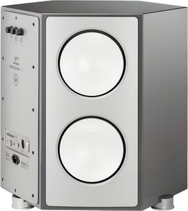 Paradigm Persona SUB center subwoofer i antracitgrå metal kabinet, set fra venstre forfra i trekvart vinkel, med to store hvide, cirkulære højttalere placeret oven på hinanden på fronten og et sidepanel med betjeningsknapper og tilslutninger