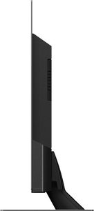 Televizor Panasonic TX-48MZ1500E, pohled z boku, černý plochý obdélníkový displej, vertikální kovový stojan, tenké okraje