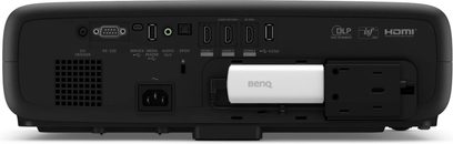 Benq W4100i beamer, rechthoekige zwarte behuizing, achteraanzicht, HDMI-, USB-, audio- en voedingspoorten, afneembare witte Benq-module, ventilatieroosters links, DLP- en HDMI-labels
