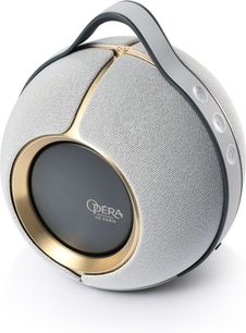Devialet Mania Opéra de Paris bluetooth-højttaler i lysegrå set forfra, tekstilgitter, gylden ring