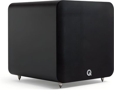 Q Acoustics Q SUB100 black subwoofer, rectangular MDF cabinet with matte finish, rounded edges and fabric front panel, silver Q logo at the bottom, set on four metal spikes, three-quarter front view