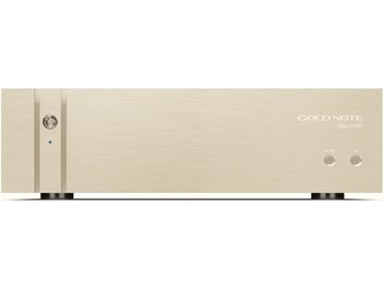 Separat hi-fi-strømforsyning Gold Note PSU-1250 i børstet guld, set forfra med rundt logo og to knapper til højre