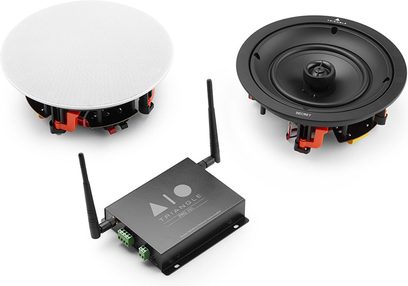 Stereo hi-fi ojačevalnik Triangle AIO PRO A50, dve okrogli črni zvočniki, pravokotni črni ojačevalnik, pogled od zgoraj