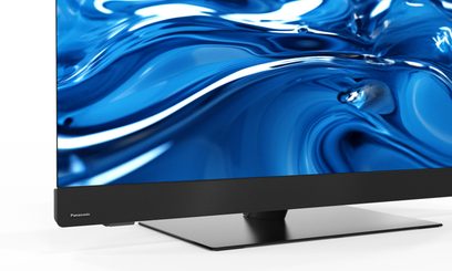 Panasonic TV-42Z90BE6 high-definition television, black, slim metal frame, integrated perforated speaker bar, and flat metal stand, three-quarter front view