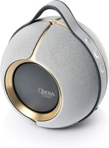 Devialet Mania Opéra de Paris ljusgrå Bluetooth-högtalare sedd framifrån, textilgaller, guldring