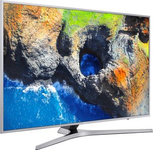 Samsung UE40MU6405 fladskærms-tv, der viser et farverigt billede af klipper og blåt vand, set forfra