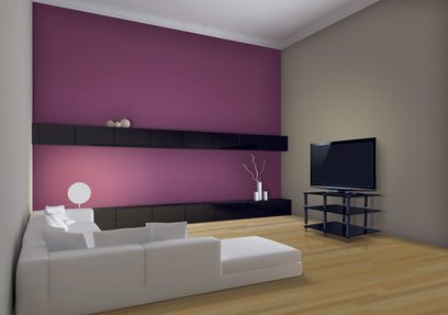 Sort-hvidt TV-møbel med hylder, i en moderne stue med rosa og beige vægge, med hvid sofa og fladskærms-TV