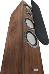 Canton Townus 100 walnut floorstanding speaker seen from an angle, wooden cabinet and visible drivers with black grille