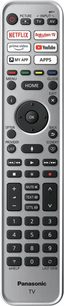 Sølvfarvet Panasonic fjernbetjening med sorte knapper og LCD-skærm, til TV TX-65JZ1500E, set forfra