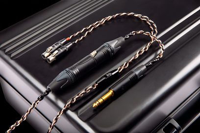 Audeze savīts vara audio kabelis ar 6,35 mm džeka savienotāju un dubulto melno mini XLR uz melnas metāla korpusa
