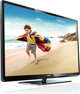 Philips 42PFL3507H fladskærms-tv, der viser en glad dreng, der hopper med et farverigt stykke stof på en solrig strand