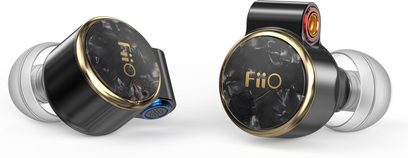 FiiO FD3 Pro in-ear headphones, two black aluminum cylindrical earpieces with a marbled black faceplate bordered by a gold ring and gold logo, red and blue connectors, translucent silicone tips, three-quarter view