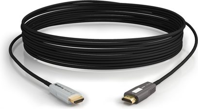 Wyrestorm CAB-HAOC-10 sort HDMI-kabel, med sølvfarvede stik i enderne, oprullet i spiral på hvid baggrund, set ovenfra