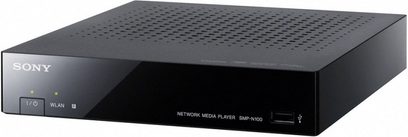 Sony SMP-N100 sort netværksaudioafspiller, set forfra, rektangulært design, perforeret gitter øverst, knapper og porte på forsiden