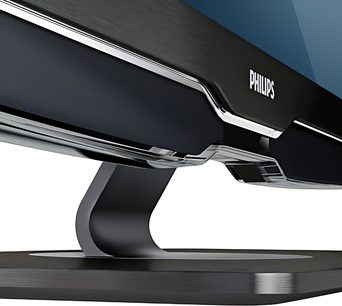 Philips 37PFL9604H sort TV, nærbillede af profilen af den buede, børstede metalfod og -base