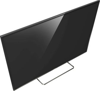 Panasonic TX-55CX680E fladskærms-TV, sort skærm slukket, let skråt forfra-syn, på metalstativ
