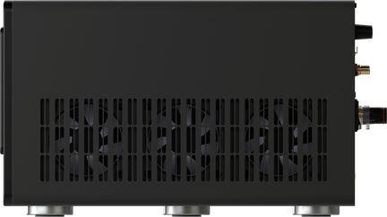 Side view of a black case with three fans visible behind vertical grills and circular metal feet