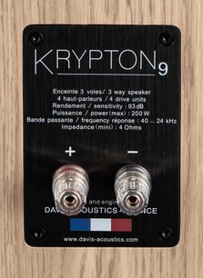 Davis Acoustics Krypton 9 Nordik white floor-standing speaker, black rear panel with white technical text, 2 transparent terminals
