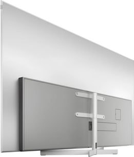 Téléviseur Loewe Stellar 83 DR+ gris argenté, vue arrière avec support central et écran extra-fin